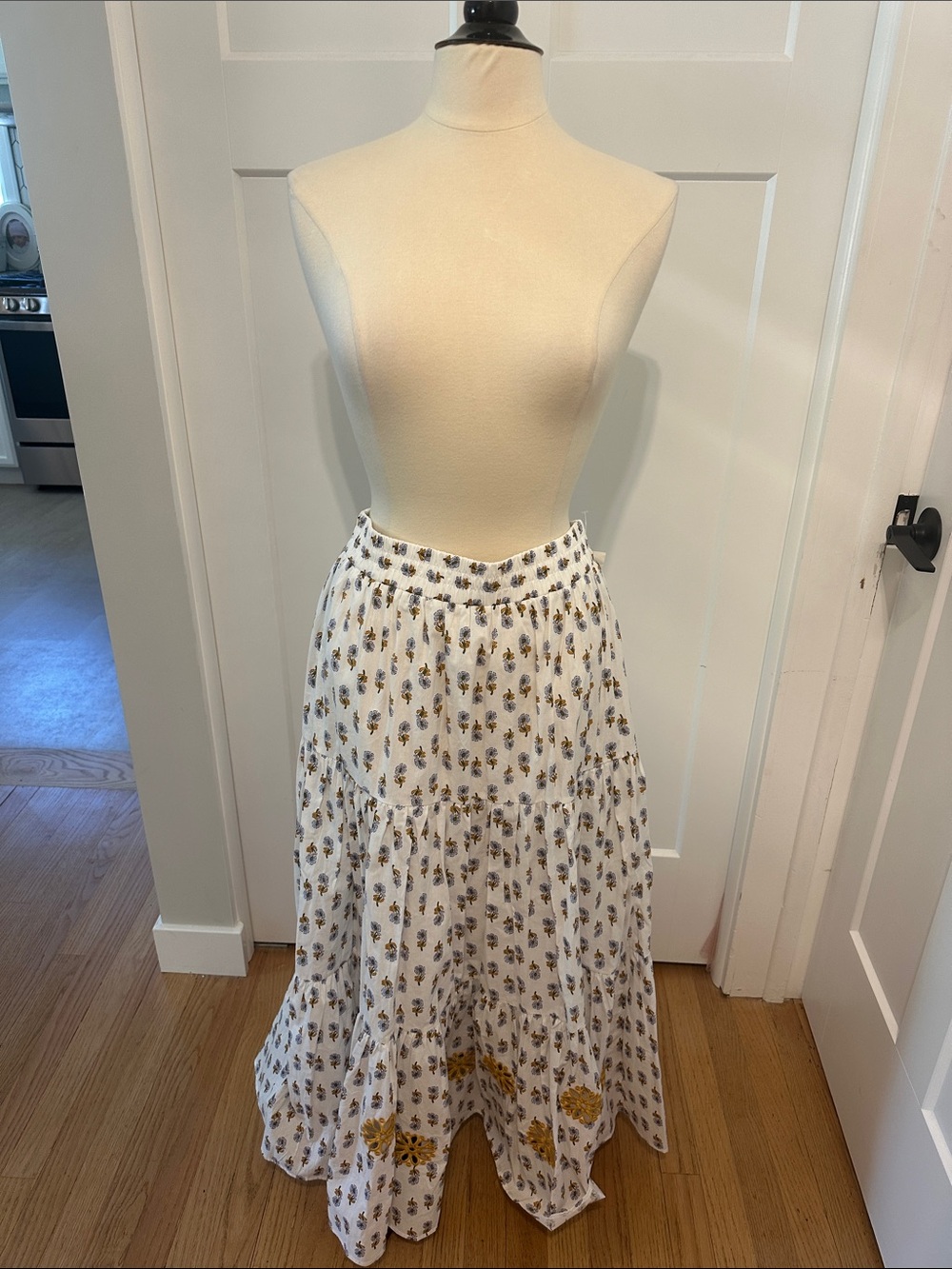 Solitaire White Maxi Skirt with Yellow Floral Motif